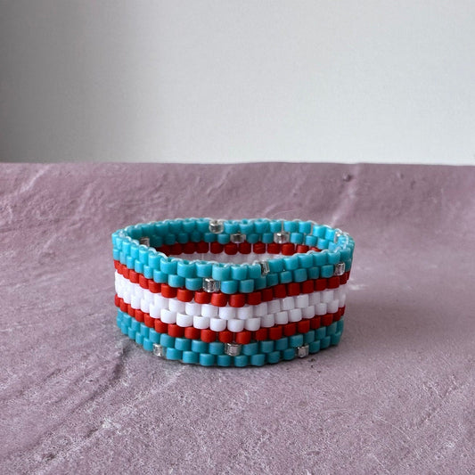 Turquoise Blue, Red and White Beaded Ring with Specs of Gold